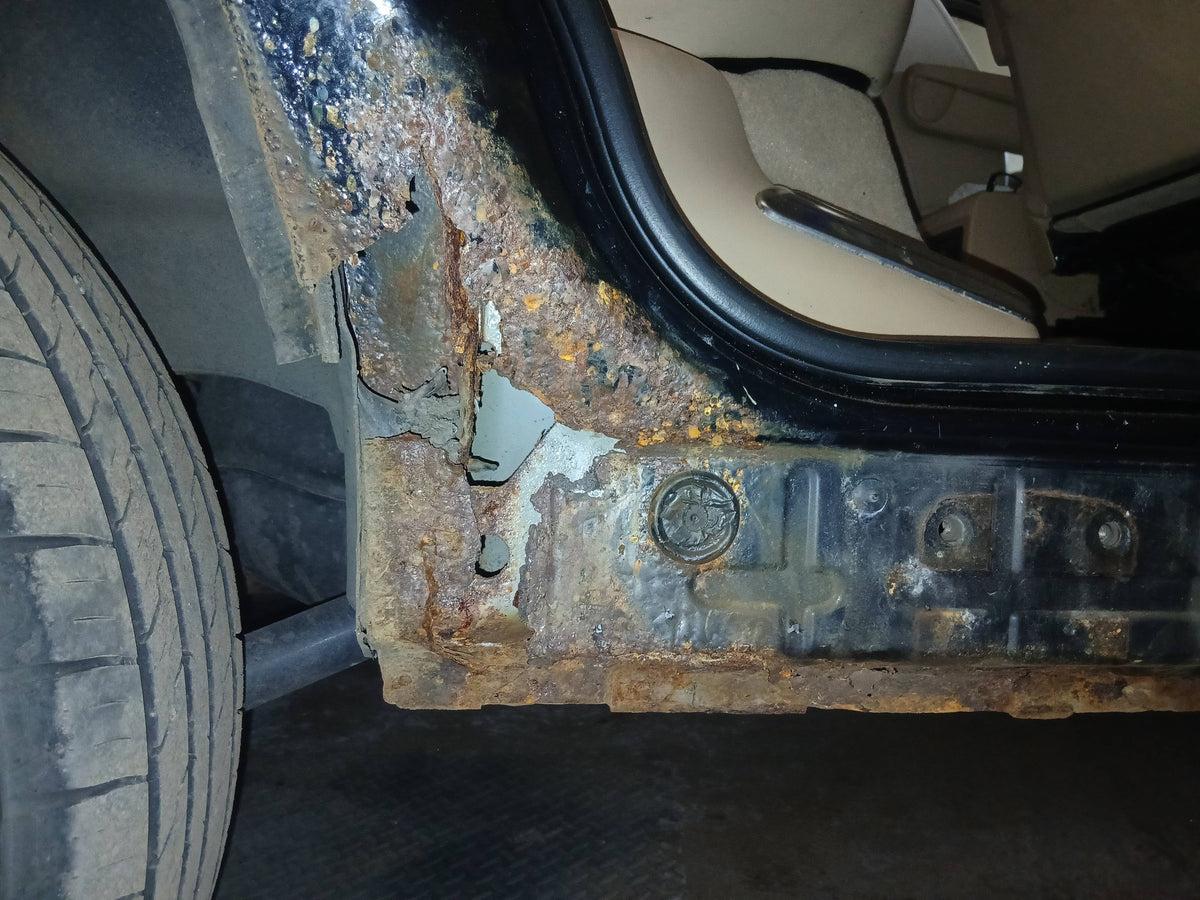 Before repair - rusty vehicle
